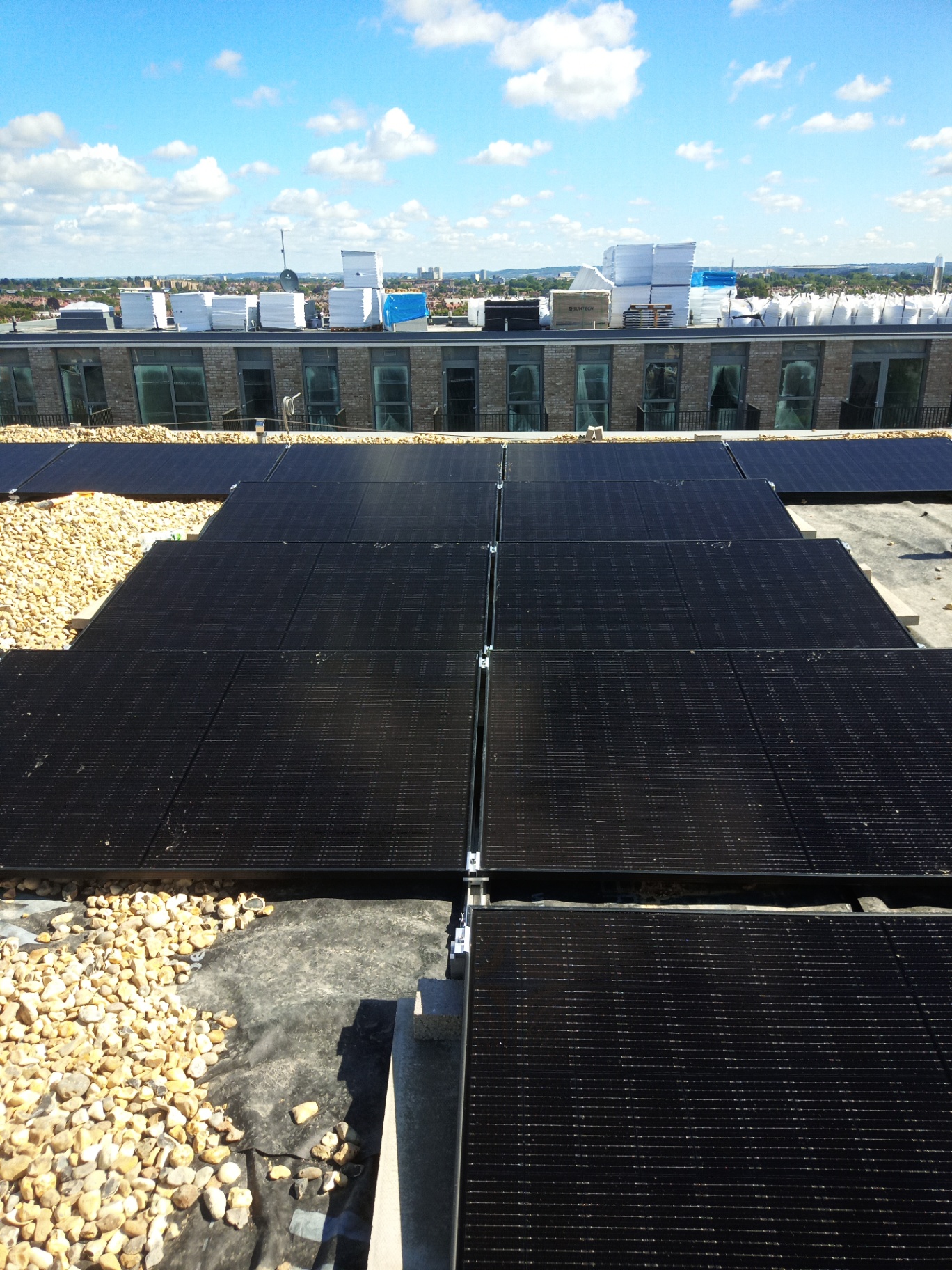 Flat-roof solar PV array on a multi-storey residential development