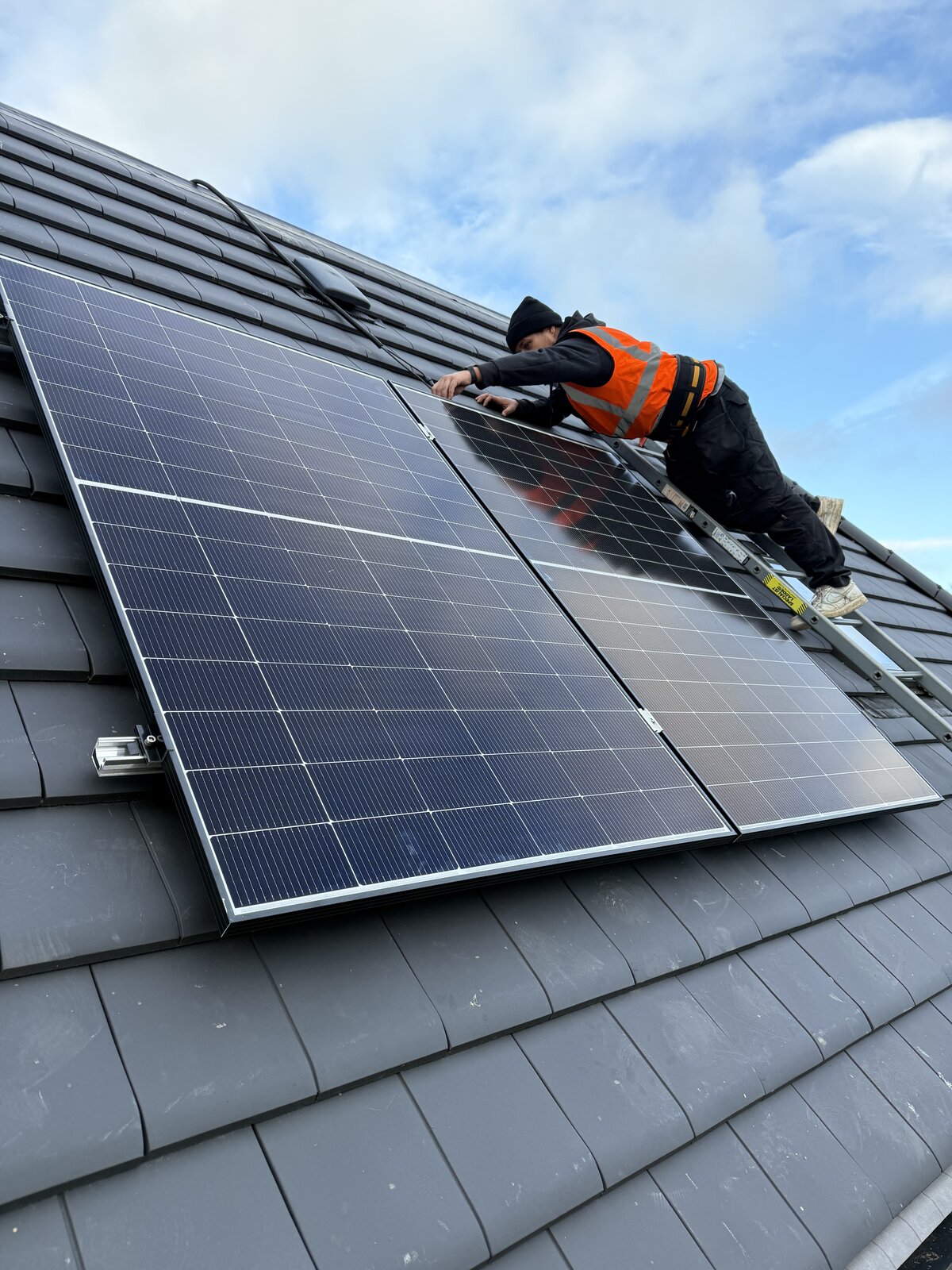 All-black panel installation on London terrace roof. — solar PV installation in Greenwich by Solid Electrical
